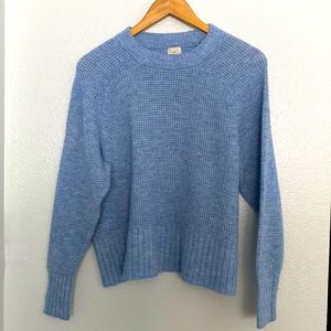 Blue knitted sweater